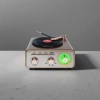 Retro black and gold color audio equipment with a green tuning knob for the turntable details Picture